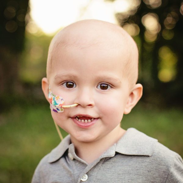 Two year old Merrick smiling in the midst of his fight with cancer